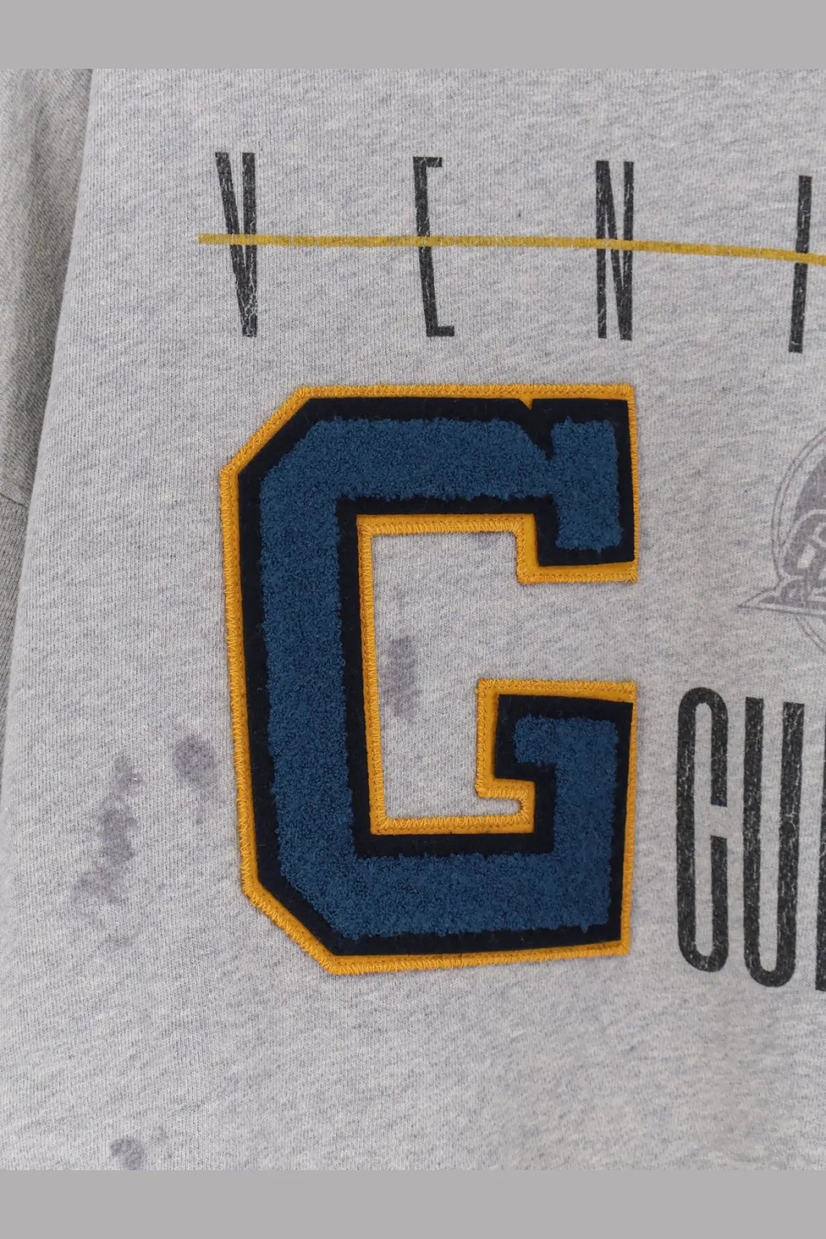 Golden Goose men’s grey cotton sweatshirt with bold embroidered blue letter c featuring yellow and black trim