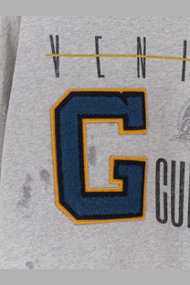 Golden Goose men’s gray cotton sweatshirt with bold embroidered blue letter c and yellow black trim on the front