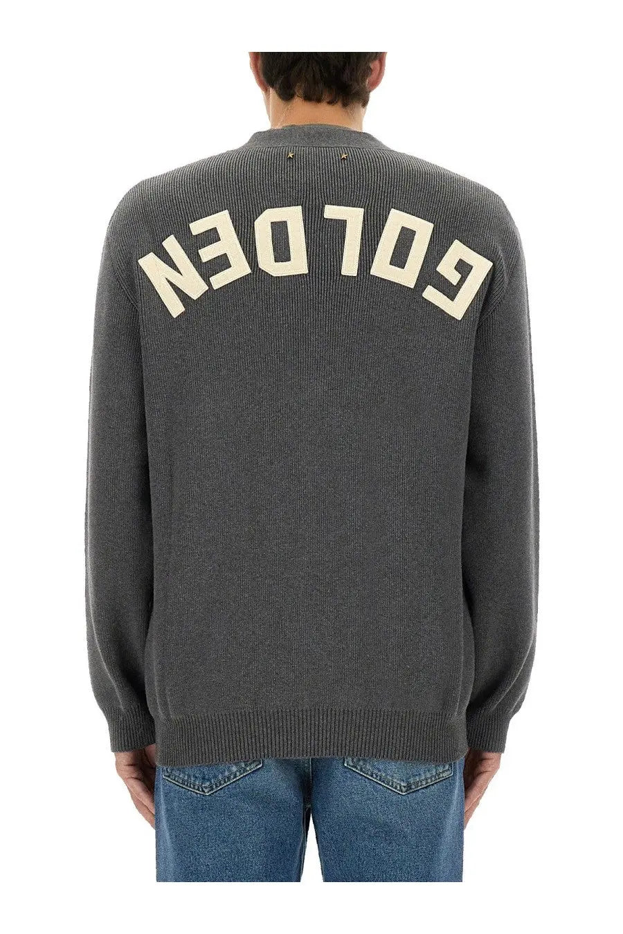Back of a golden goose men’s lapel cardigan grey showing a dark gray knitted sweater with cream golden lettering