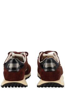 Back view of golden goose men’s marathon sneaker red in maroon suede with black rubber heel tab and cream midsole