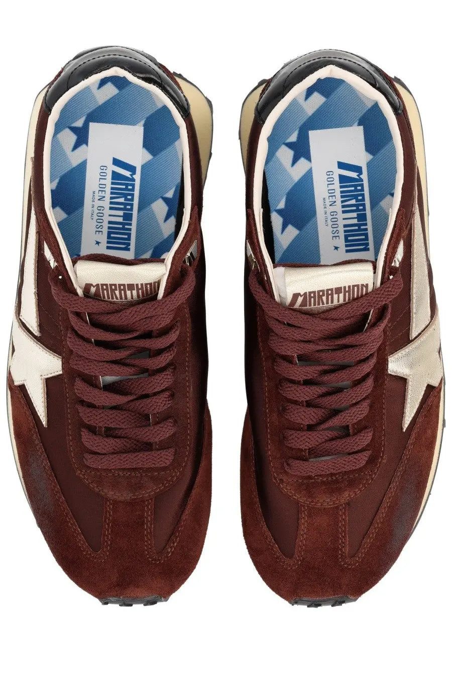 Golden Goose men’s marathon sneaker in maroon suede with white star accents and a worn vintage look