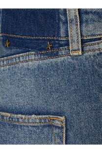 Back side of golden goose men’s blue denim happy jeans with gold star metal studs on the back pocket
