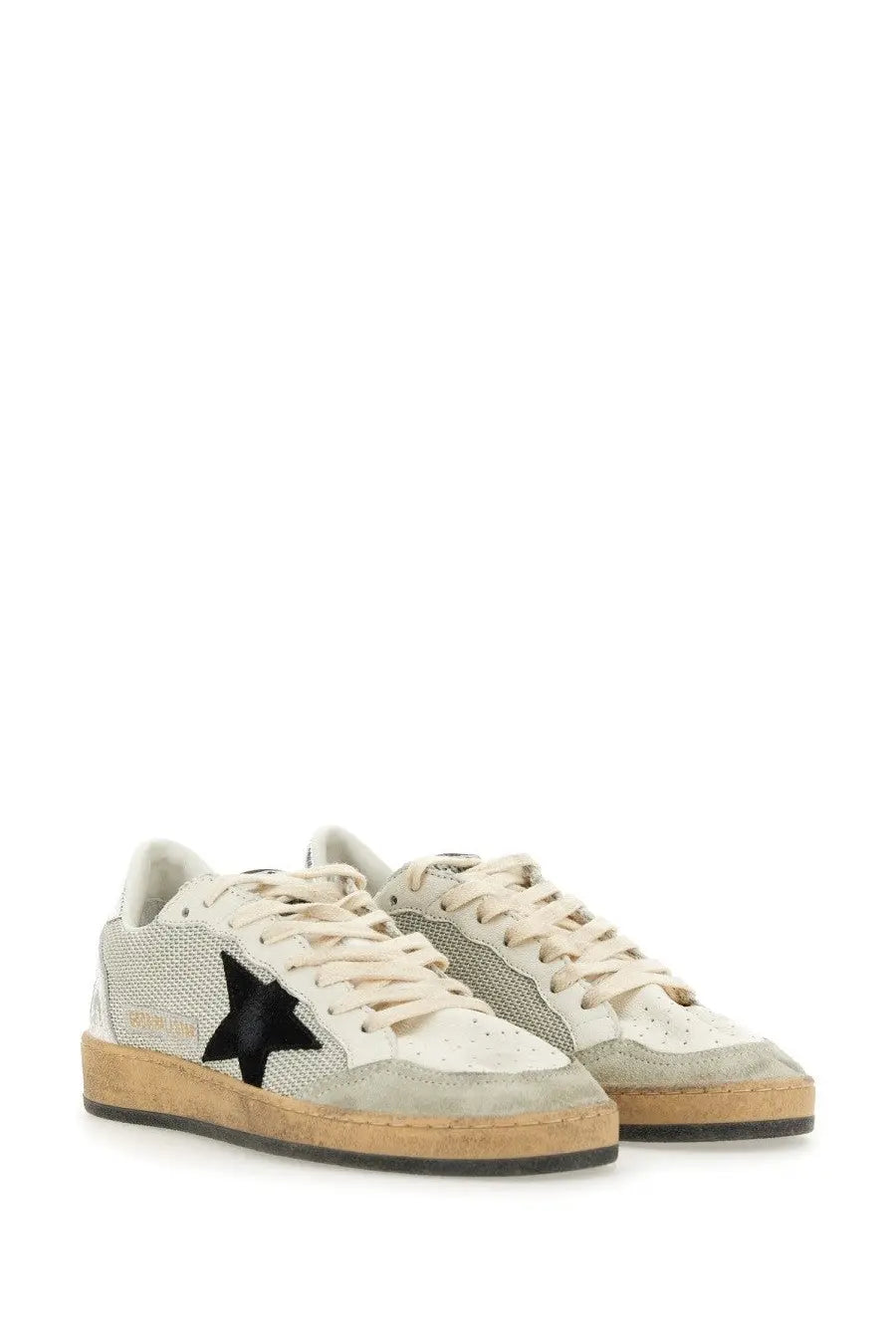 Cream-colored Golden Goose men’s sneaker ball star silver with black star emblem and mesh suede materials