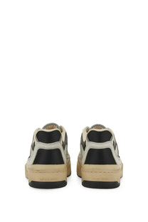 Golden goose men’s sneaker white featuring black and beige suede with a chunky sole for casual wear