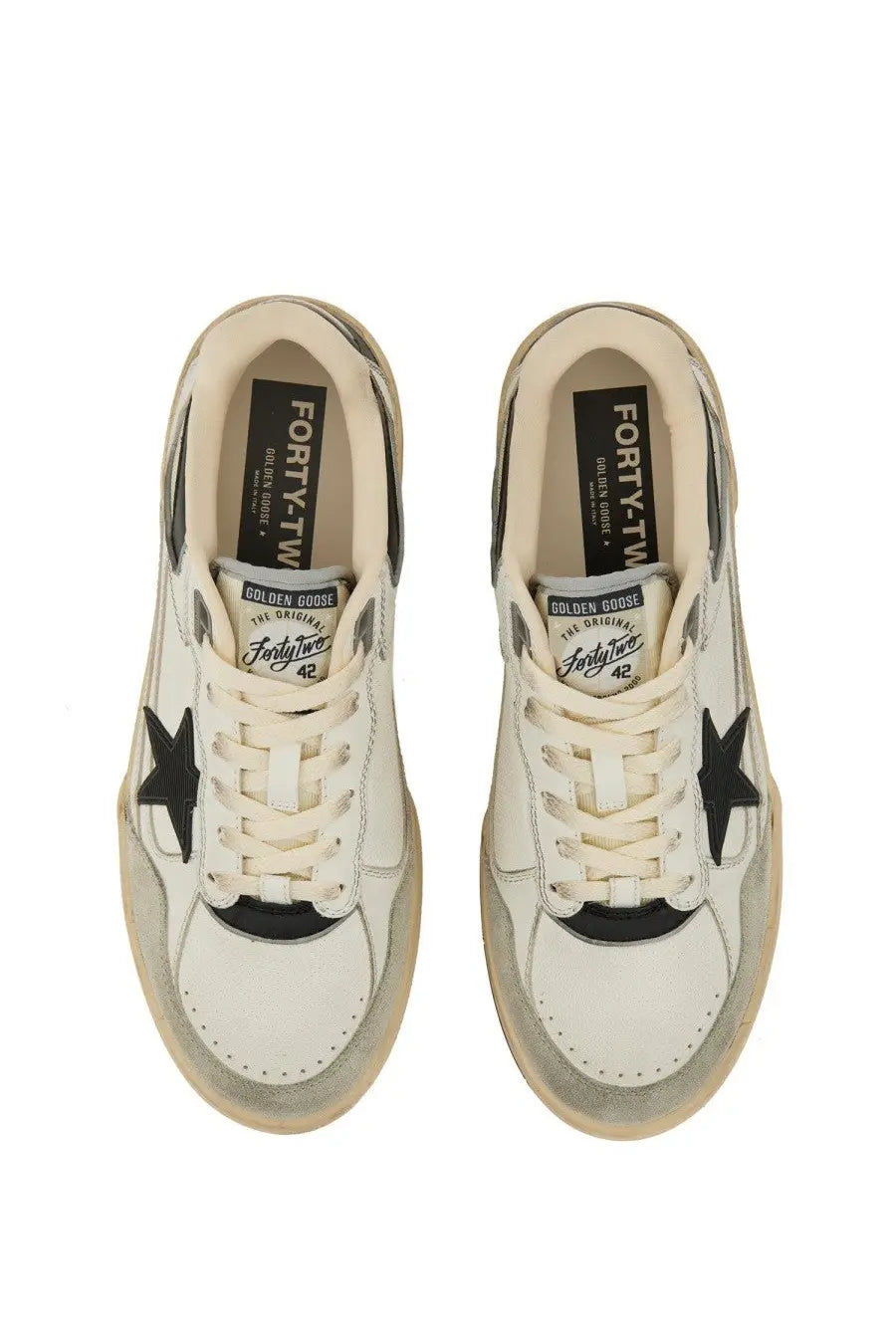Golden Goose men sneaker white leather with black star accents and vintage distressed finish golden goose forty four model