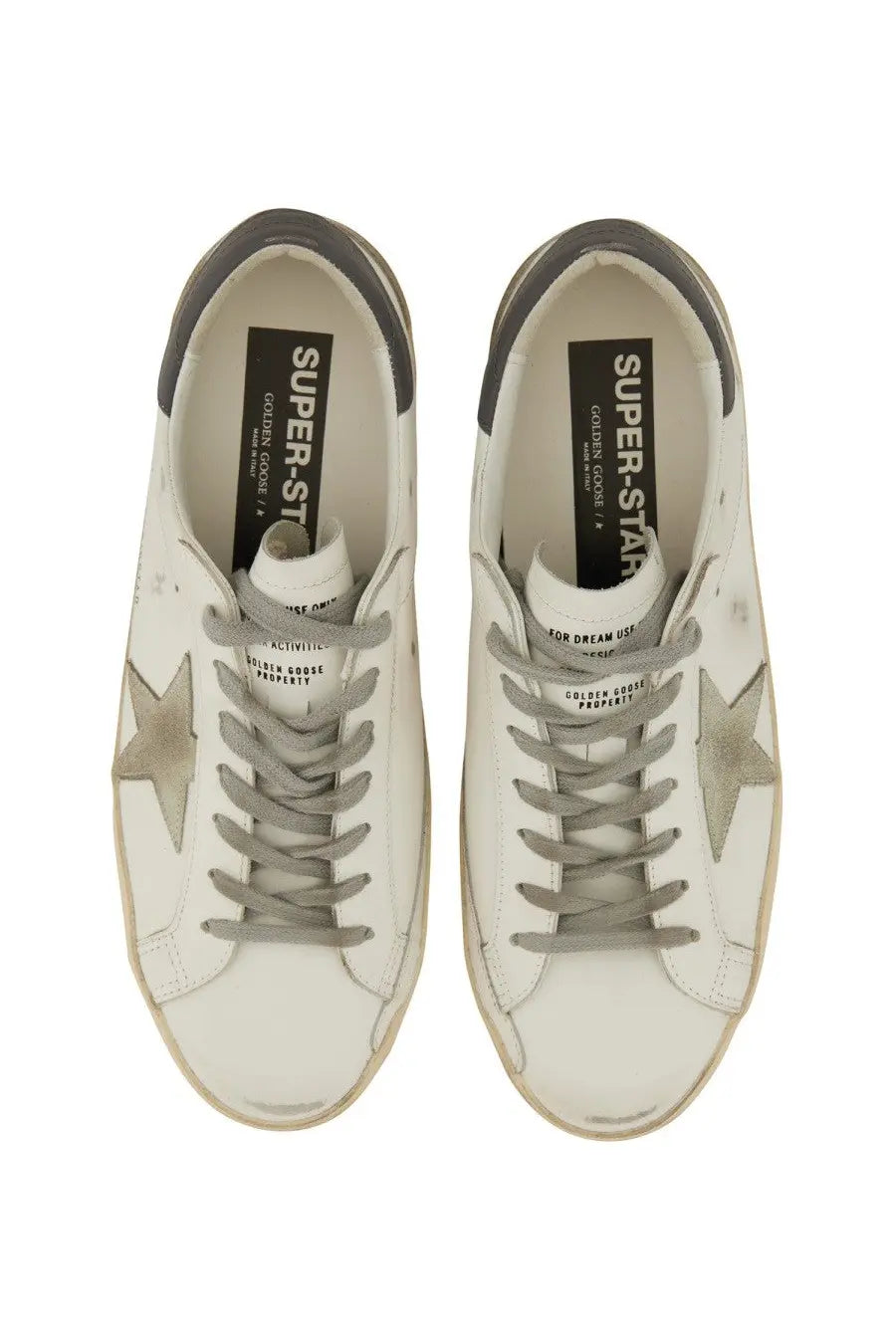 Golden Goose mens Super Star white leather sneakers with metallic star