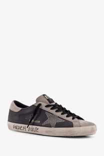 Golden Goose men’s superstar leather sneakers in grey suede with black star in silver studs and distressed sole