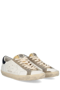 Golden Goose men’s Superstar sneaker white suede with beige star design and Golden Goose logo on the tongue