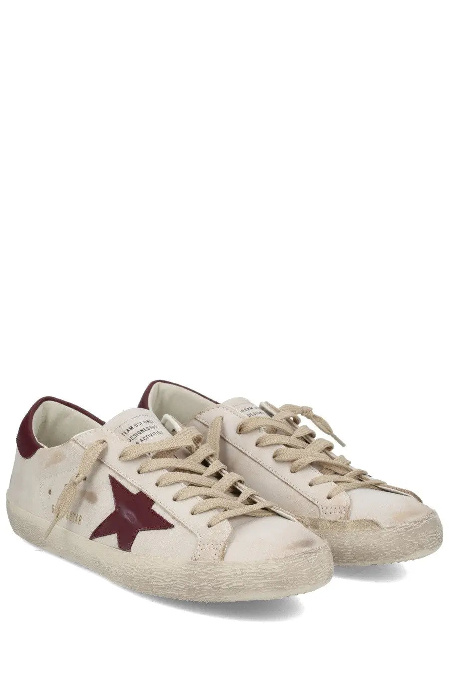 Golden Goose men’s superstar cream suede sneakers with maroon star logo and matching heel tab in white color