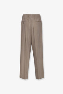 Beige pinstripe wool blend trousers with elastic waistband and two rear pockets golden goose roasted cashew
