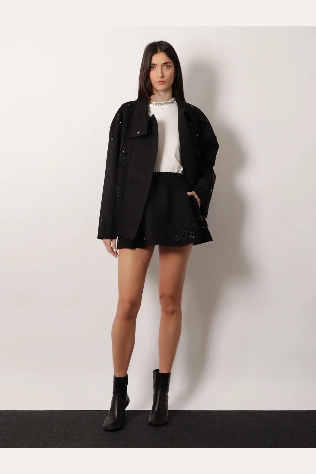 Golden Goose women’s black denim bomber jacket with black embellishments and subtle glittery details