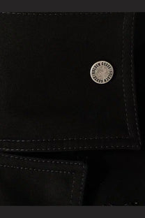Black leather wallet with silver circular golden goose logo emblem complementing golden goose women’s black denim jacket black
