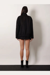 Golden Goose women’s black denim jacket with oversized fit and subtle texture in relaxed style
