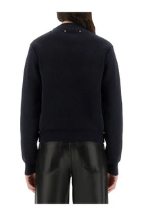 Golden goose women’s black cotton knit sweater with gold-tone star embellishments at the neckline