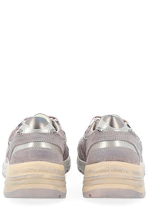 Silver and gray suede golden goose women’s dad star sneaker blue with metallic accents and chunky beige sole back view