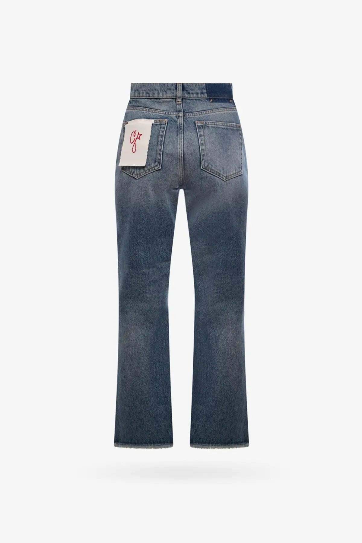 Back side of golden goose women’s derin new cropped flare jeans in faded blue denim with a white patch and red embroidery