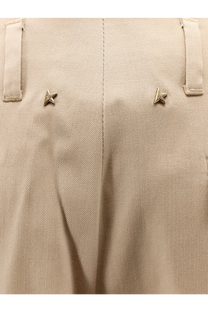 Beige Golden Goose women’s Flavia virgin wool trousers with silver star metal accents on pleated waistband