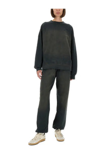 Dark olive green oversized sweatshirt with relaxed fit and ribbed cuffs paired with golden goose women’s grey jogging pants