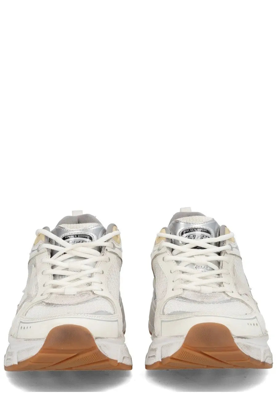 Golden Goose women’s Lightstar sneaker in white with silver chunky details and a tan rubber sole