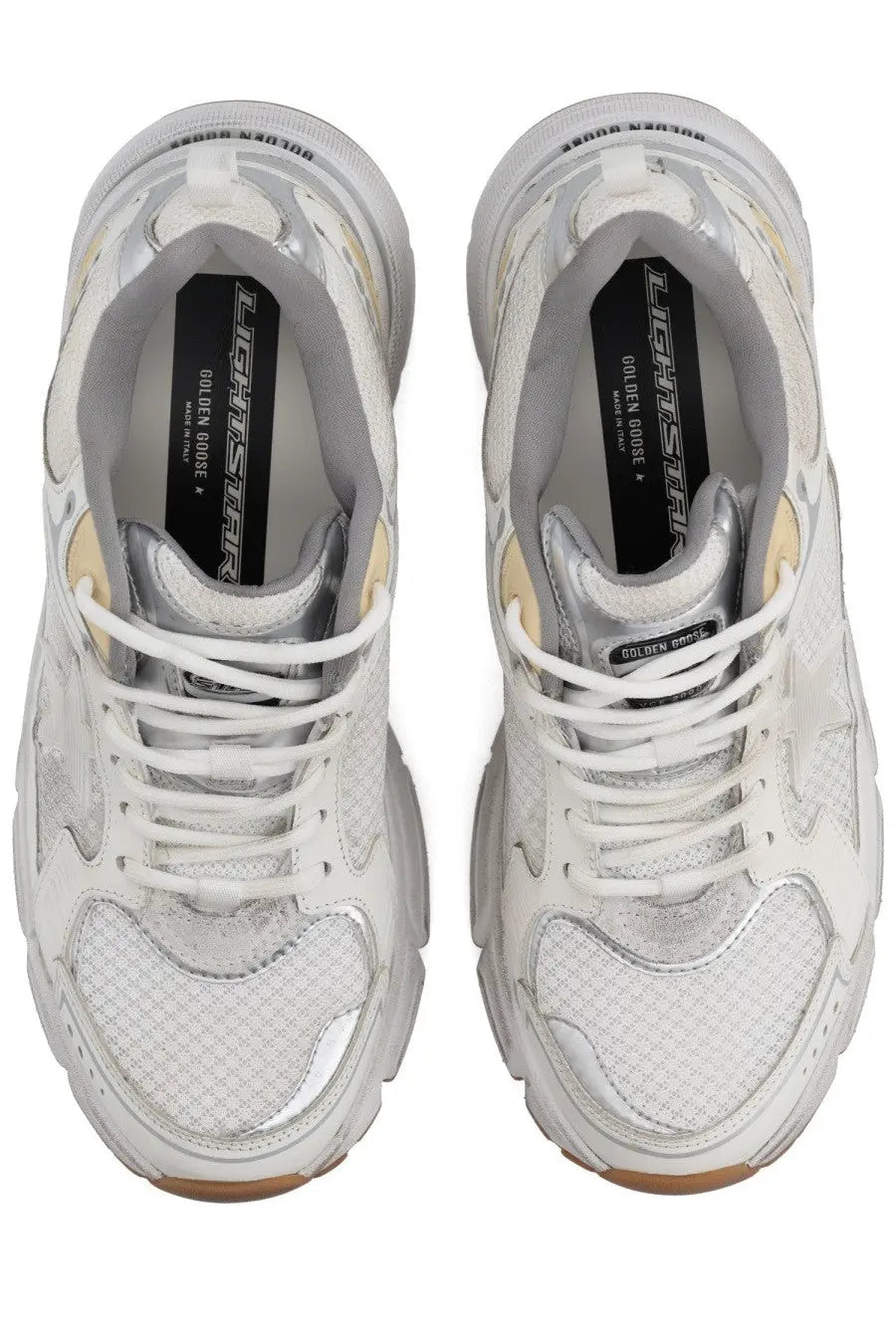 Golden Goose women’s Lightstar sneaker white with silver mesh upper and chunky sole featuring golden goose logo insole