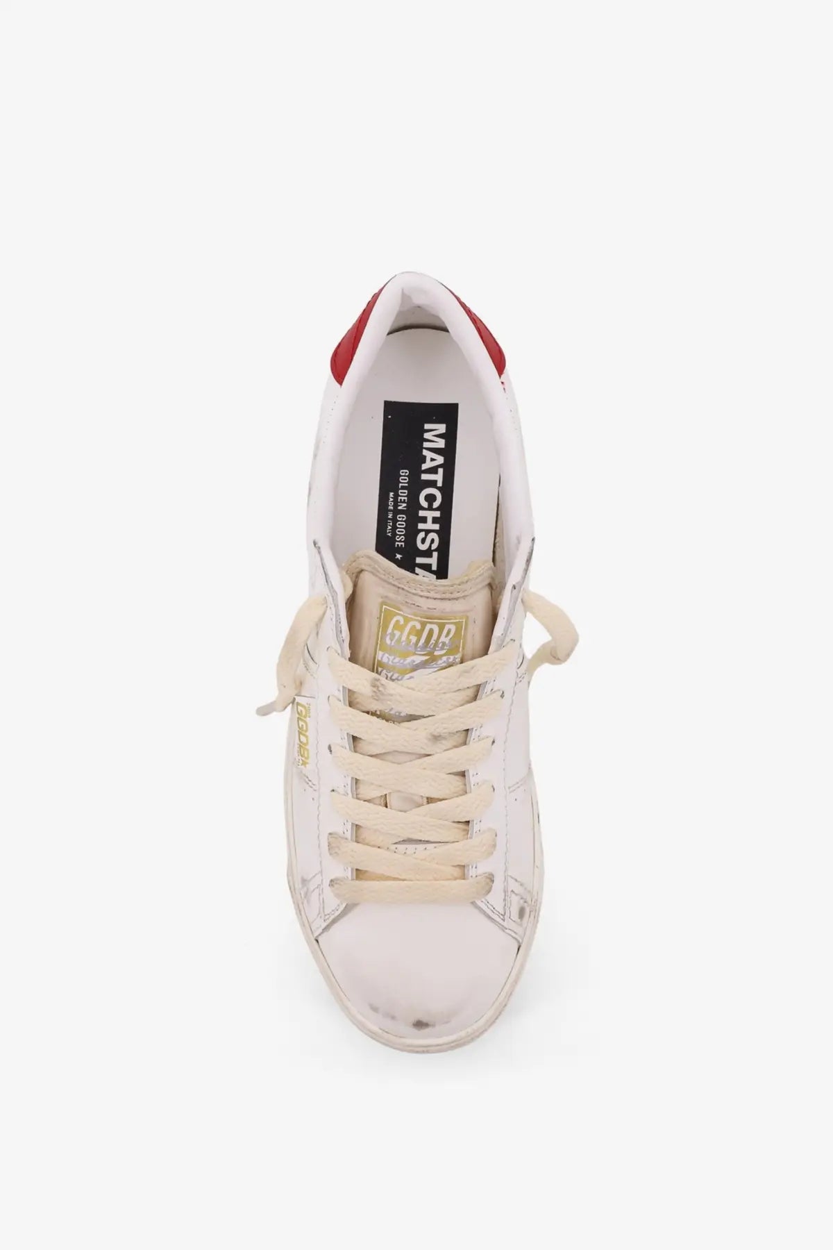 Golden Goose women’s matchstar leather sneaker in white with red heel tab beige laces and golden sole accents