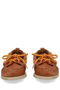 Golden Goose women’s moccasin cruise brown leather boat shoes with orange laces front view