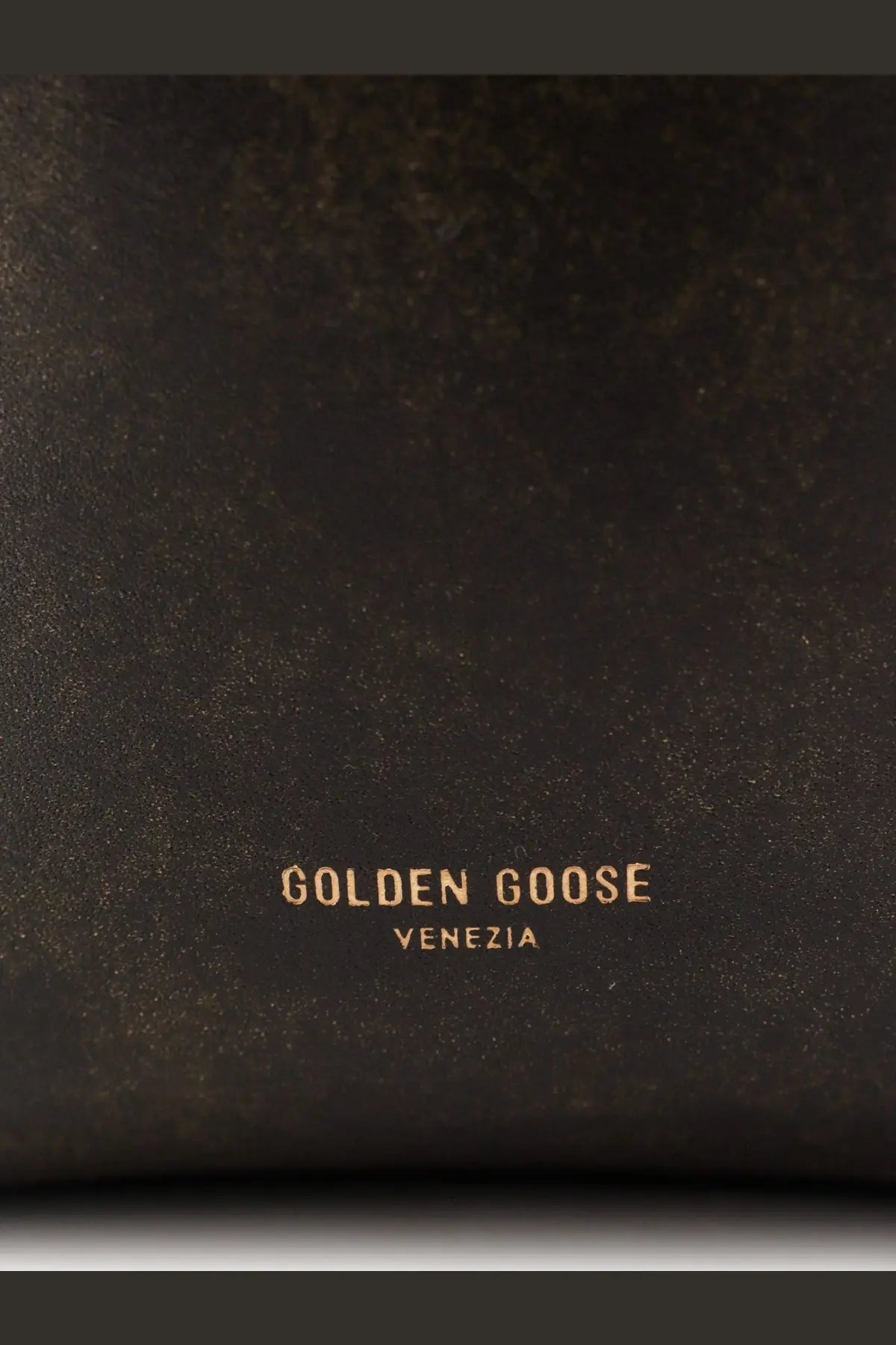 Dark brown leather with gold foil golden goose venezia branding on golden goose women’s vintage leather shoulder bag black