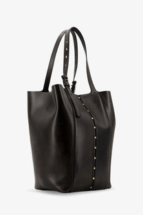 Golden Goose women’s black leather tote bag with gold-tone studs along front seam and matching handles