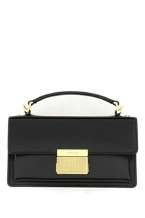 Golden Goose women’s small Venice bag is a black leather handbag with gold-tone hardware and a textured rectangular clasp