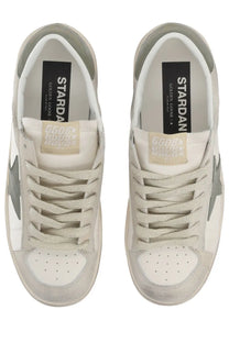 Golden goose women’s stardan sneaker beige with white and gray suede, metallic star logo, perforated toe caps, and matching laces