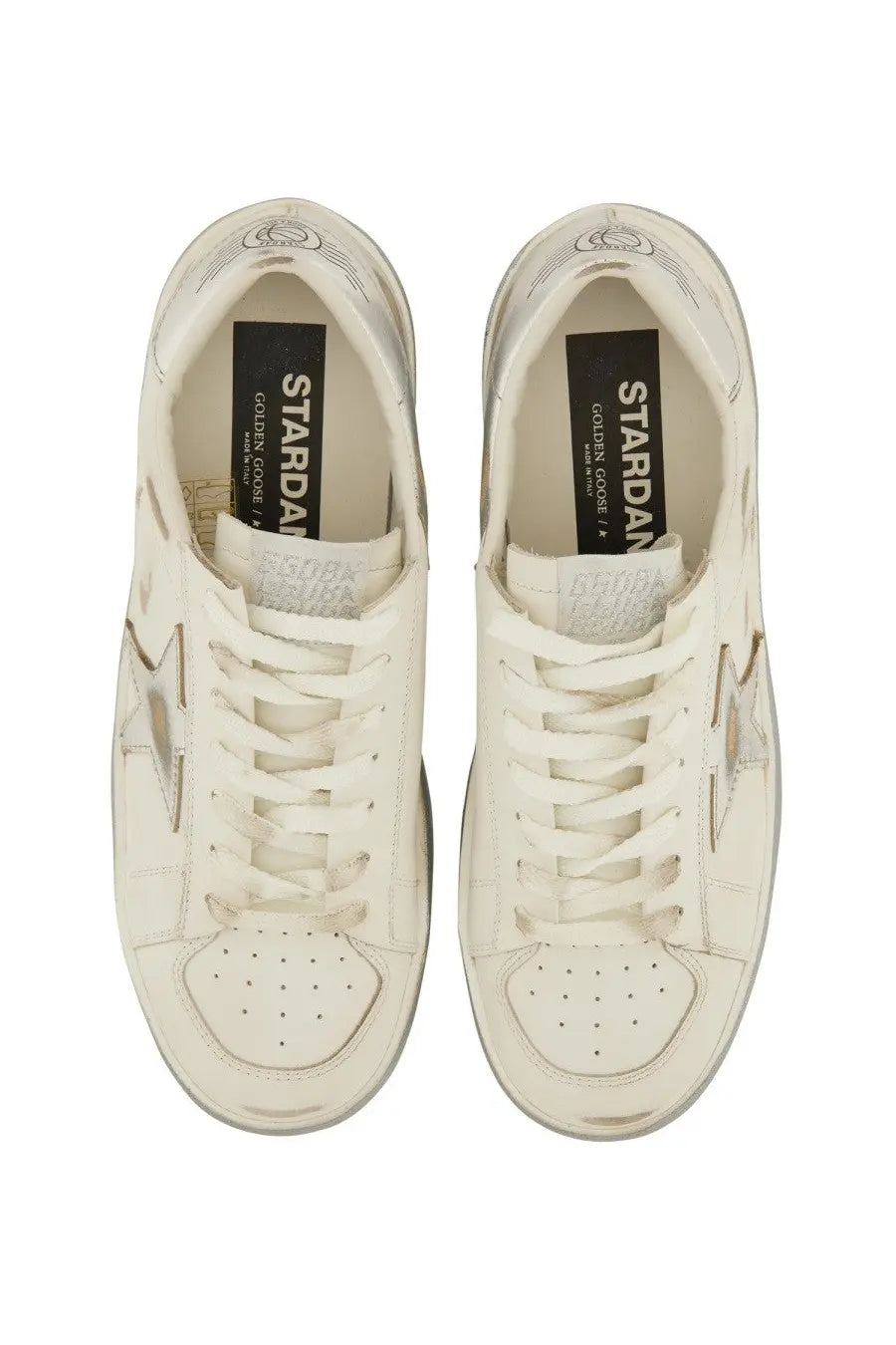 Cream-colored leather Golden Goose women’s Stardan sneaker with metallic star emblem and classic lace-up design