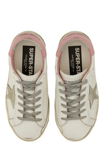 Golden Goose women’s super star sneaker white leather with pink accents and silver star patches