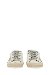 Golden Goose women’s super star sneaker white leather with gray laces and a faded distressed finish