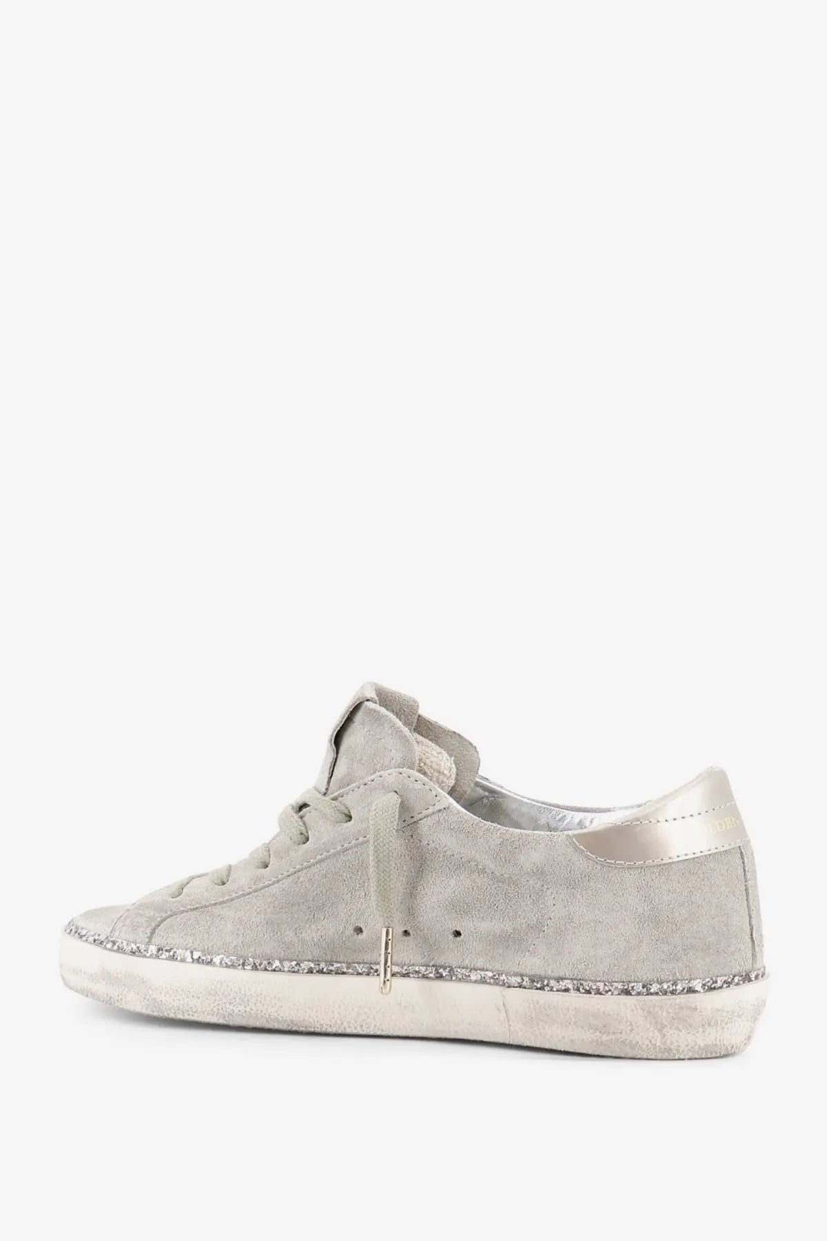 Golden Goose women’s super star beige suede sneaker with gray distressed sole and silver glitter trim edge