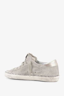 Golden Goose women’s super star beige suede sneaker with gray distressed sole and silver glitter trim edge