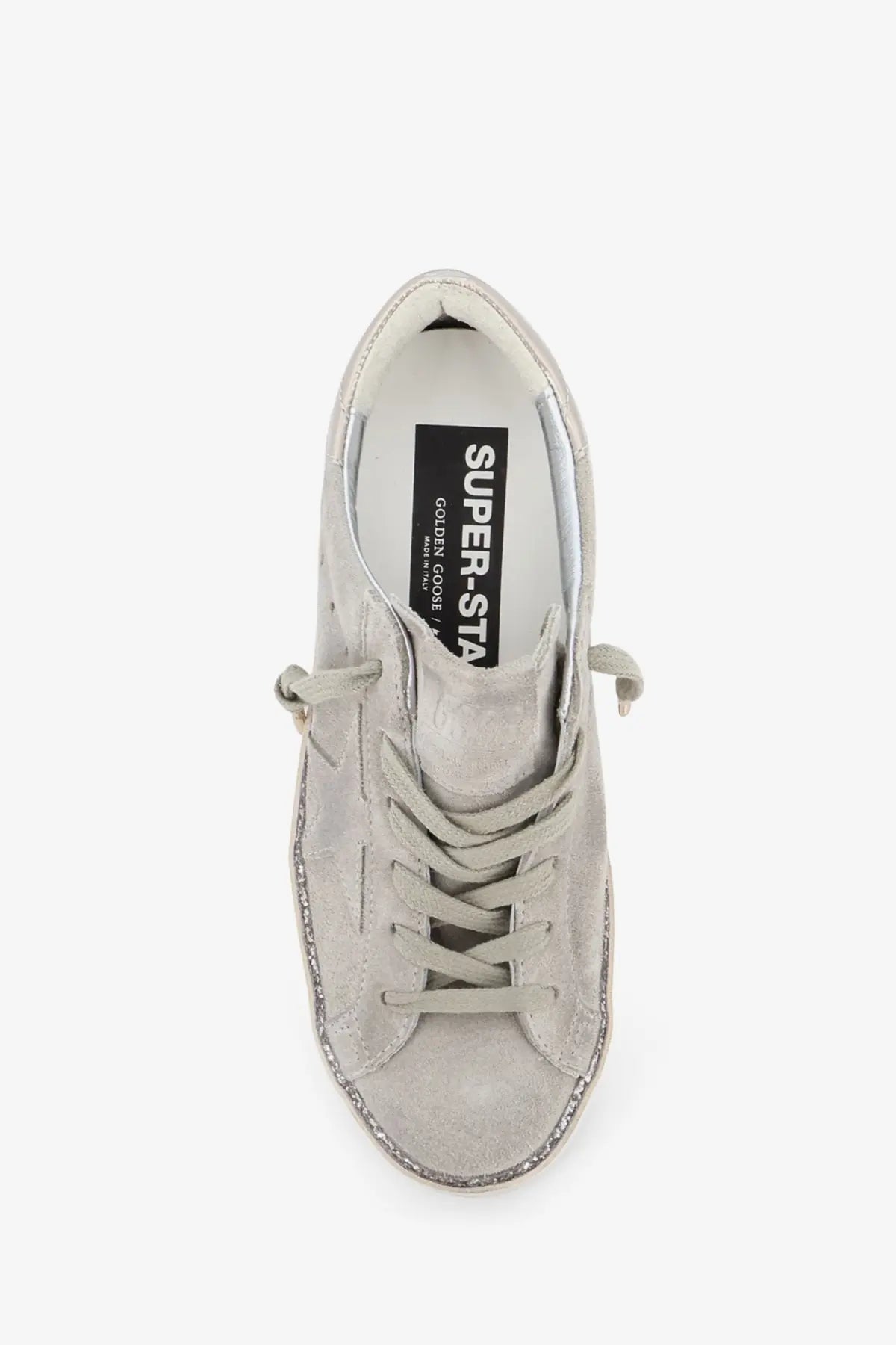 Silver suede Golden Goose women’s super star sneaker with glittery toe cap and heel featuring logo insole