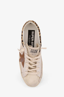 Beige suede golden goose women’s super star sneaker with brown star patch and leopard print collar trim