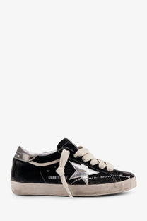 Golden Goose women’s Superstar chenille low-top sneaker in black suede with metallic silver star and off-white laces