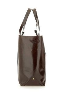 Golden Goose women’s tote bag in brown glossy leather with structured handles and gold-tone accent at the base
