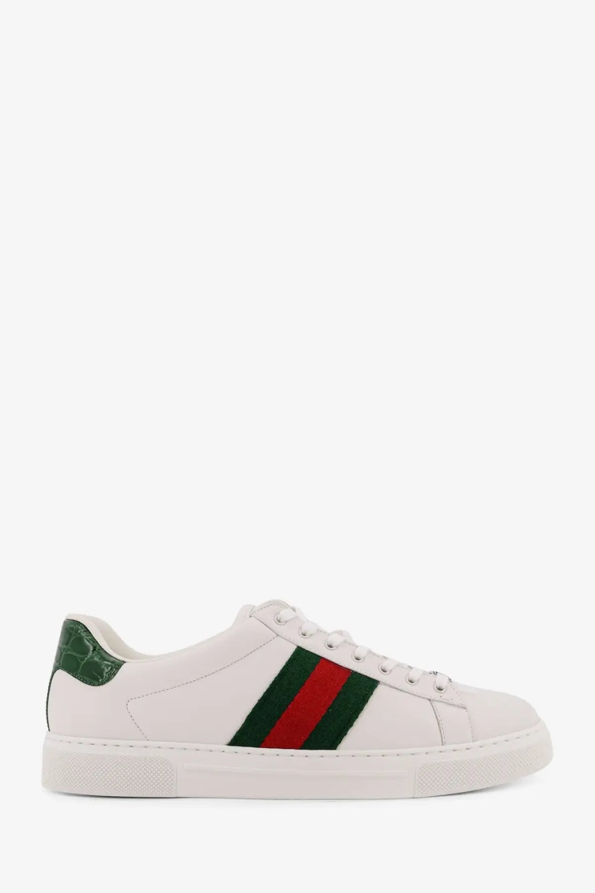 White Gucci men’s Ace low top leather sneakers with green and red stripes and crocodile-embossed heel tab