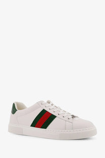 White gucci men s ace low top leather sneakers with classic red and green stripes and textured heel tab