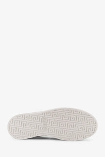 White rubber sole with geometric pattern and icon logo on gucci men’s ace low top green leather sneakers