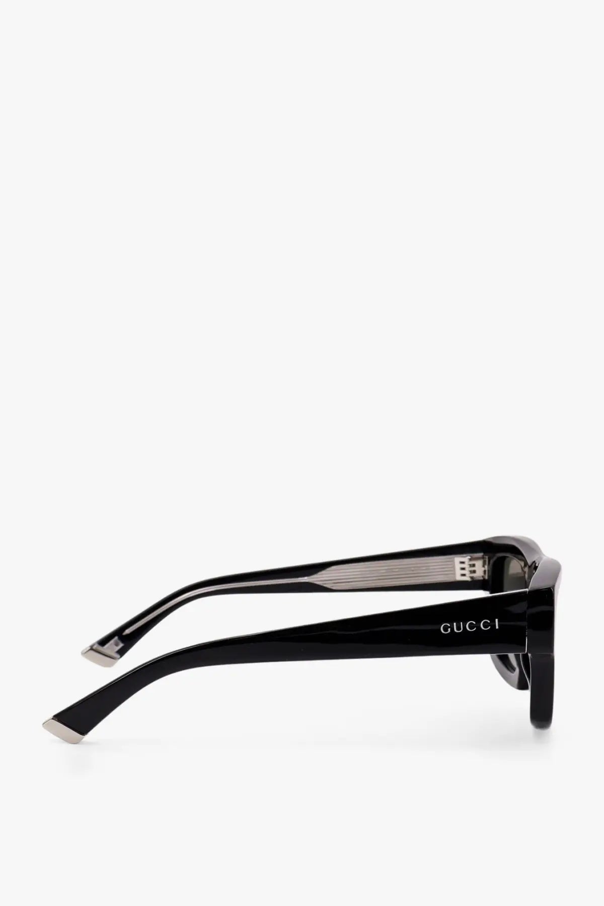 Black Gucci men’s acetate sunglasses with glossy finish and silver metal accents on the temples