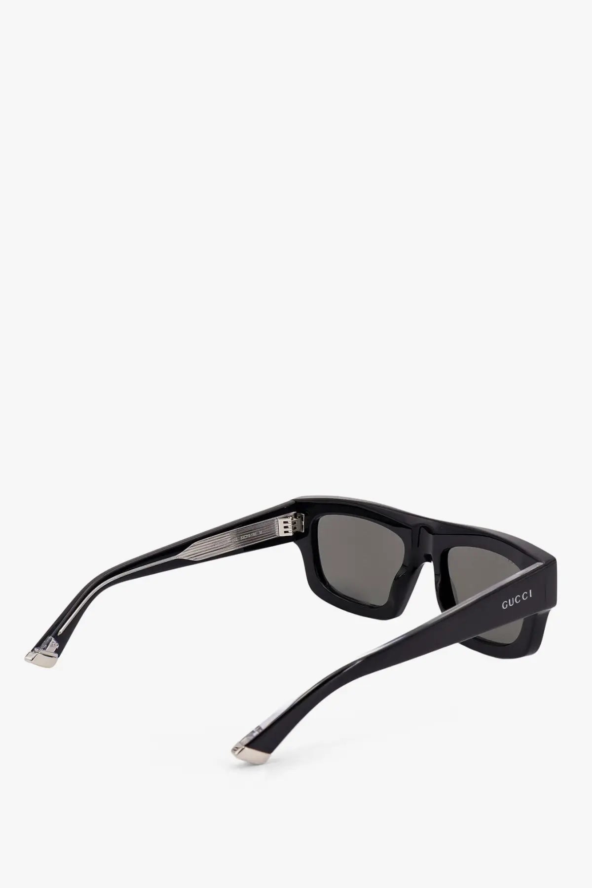 Black gucci men’s acetate rectangular sunglasses with dark gray lenses and silver-toned metal accents on temples