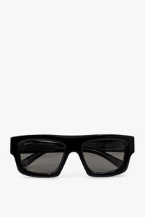 Black gucci men’s acetate sunglasses with sleek rectangular frame and dark gray gradient lenses