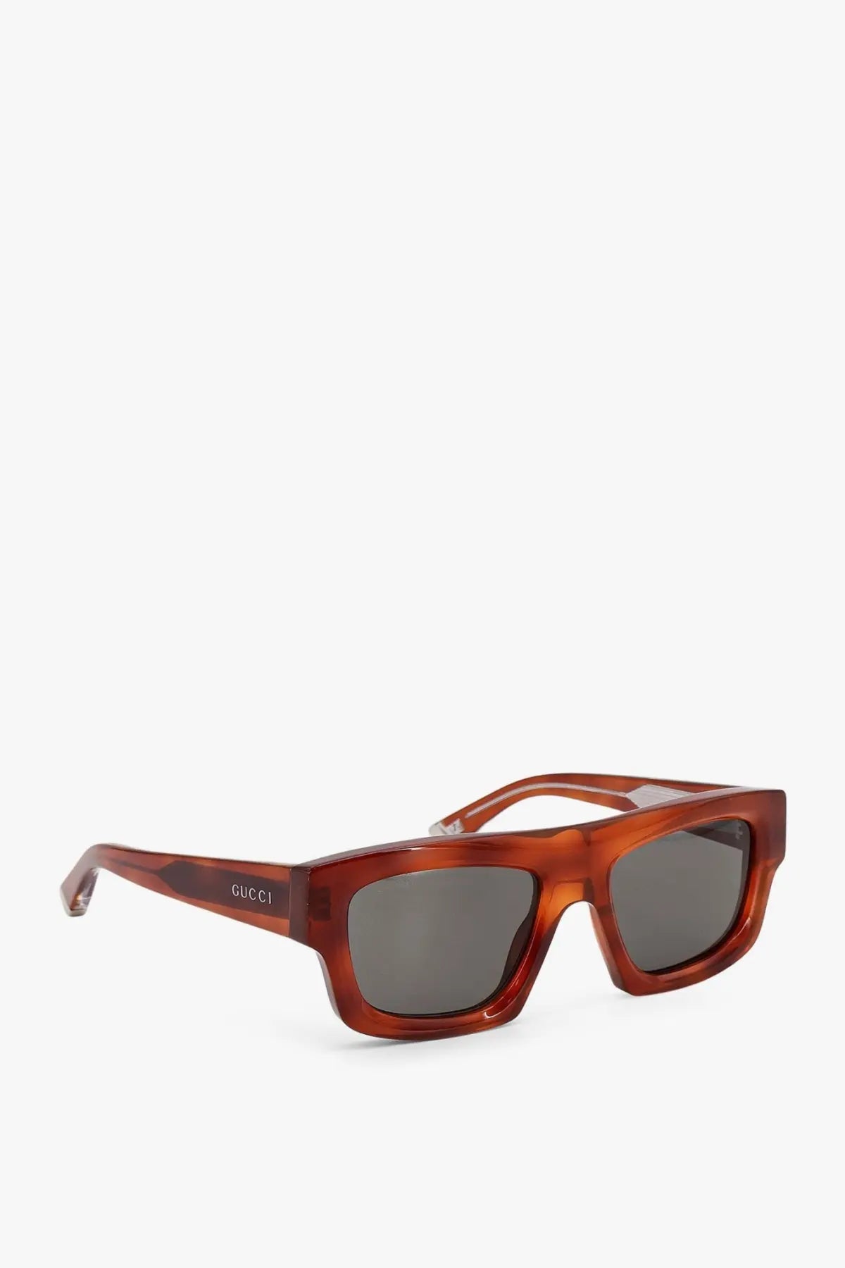 Gucci men’s acetate sunglasses with brown tortoiseshell frames and dark gray lenses for stylish sun protection