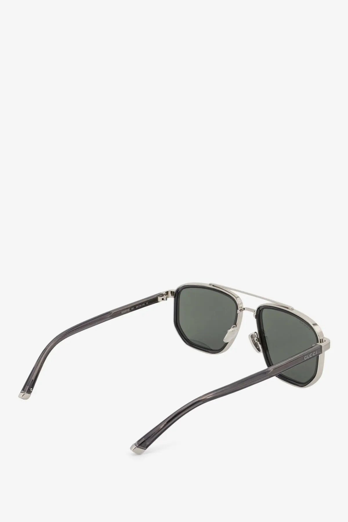 Gucci men’s acetate sunglasses with silver frame and dark gray lenses in a sleek modern design
