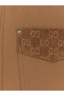 Brown corduroy patch pocket with subtle gg monogram and silver snap button on beige gucci men’s canvas jacket