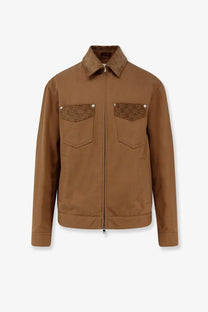 Gucci men’s beige canvas jacket with brown signature gg logo patches on chest pockets and collar