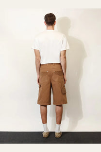 Gucci men’s beige canvas cargo shorts with multiple pockets and a sturdy utilitarian design